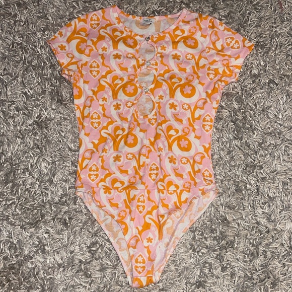 Rue21 Tops - Pink and orange print rue 21 bodysuit never worn